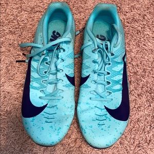 Nike spike running shoes